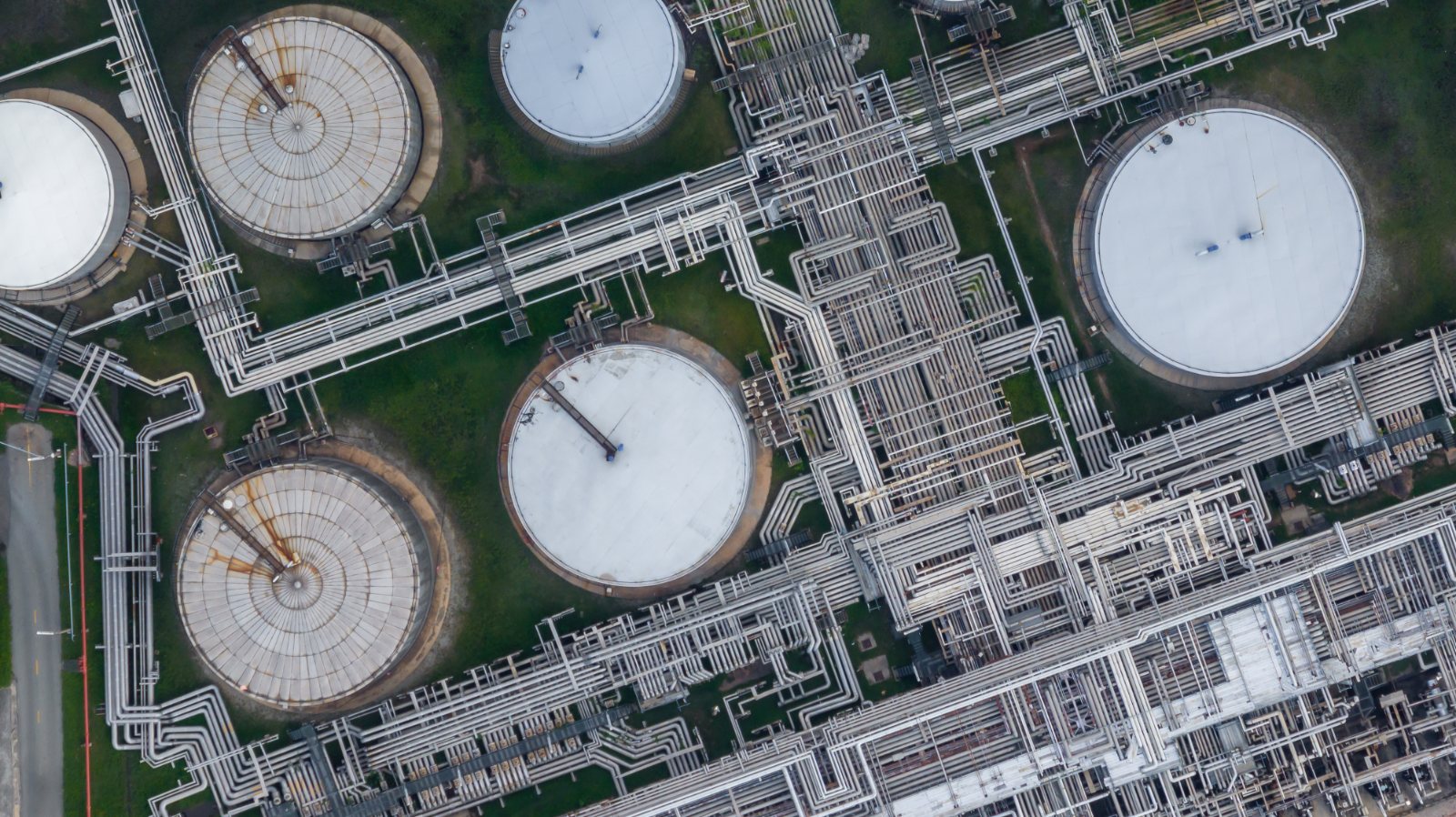 Aerial view of storage tanks and pipe racks